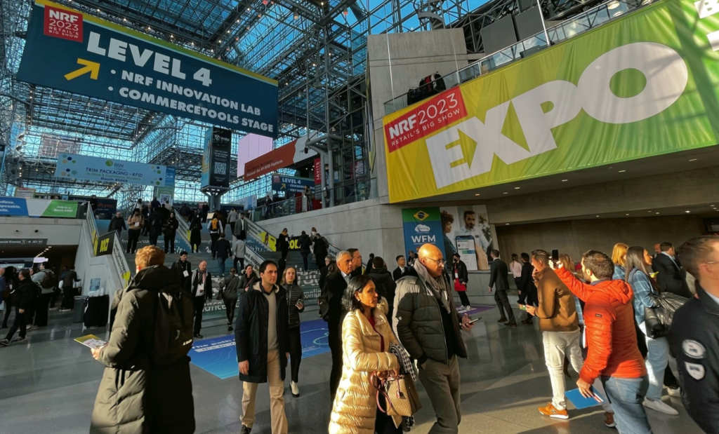 People walking in the main lobby of the Javits Center in NYC during NRF Retail's Big Show 2023.